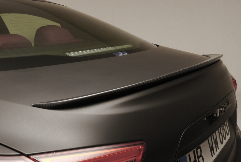 WALD Maserati Ghibli boot spoiler detail — carbon-finish boot spoiler on a matte black Ghibli