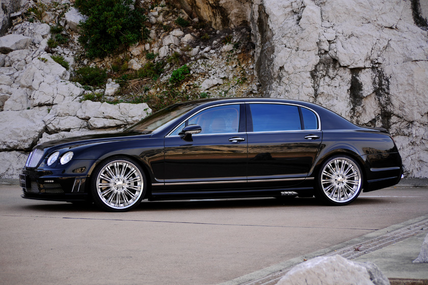 Bentley Continental Flying Spur WALD Black Bison side profile with WALD side skirts and polished multi-spoke WALD wheels