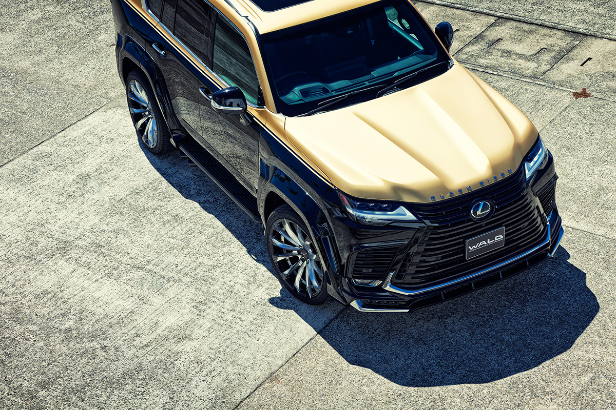 WALD Lexus LX600 Black Bison elevated front view — bonnet, front spoiler and chrome plated garnish set from above