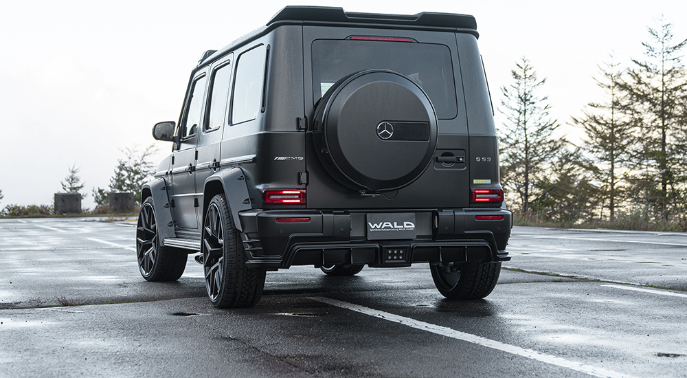 WALD Black Bison Mercedes-AMG G63 W463A rear view — matte black G63 with rear skirt, LED lamp and rear roof spoiler