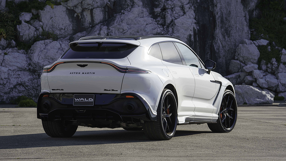 WALD Aston Martin DBX Black Bison Edition rear bumper spoiler — white DBX rear three-quarter view with WALD rear diffuser