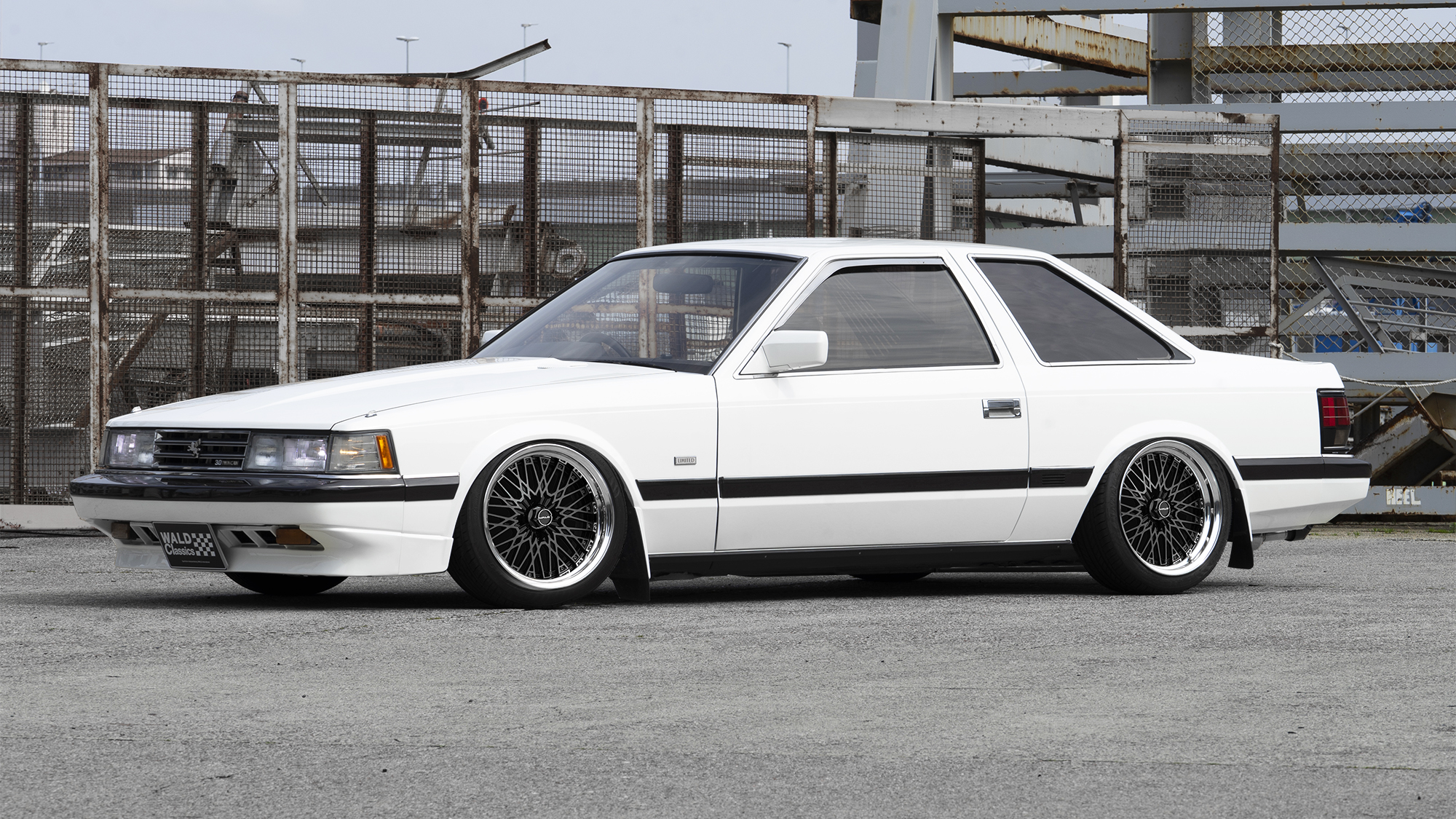 White Toyota Soarer Z10 WALD Classics on black polish WALD Classic Mesh CM12C wheels