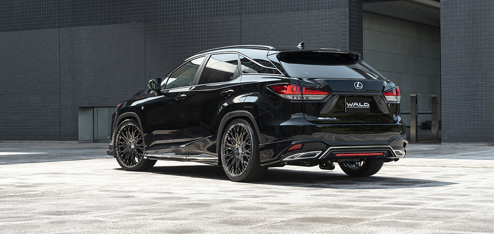 WALD Sports Line Lexus RX300 F SPORT rear three-quarter view with WALD rear skirt and LED lamp
