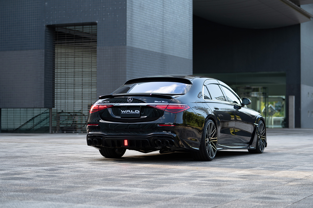 Black Mercedes S-Class W223 WALD Black Bison rear three-quarter view with boot and roof spoilers
