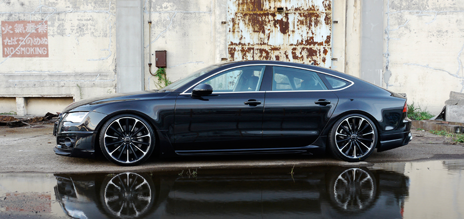 WALD Audi A7 Sportback side profile — WALD Sports Line side skirts and lowered stance on black Audi A7