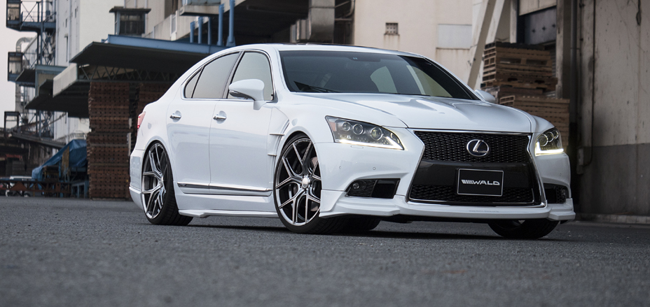 White Lexus LS front three-quarter view on WALD ILLIMA I11C wheels