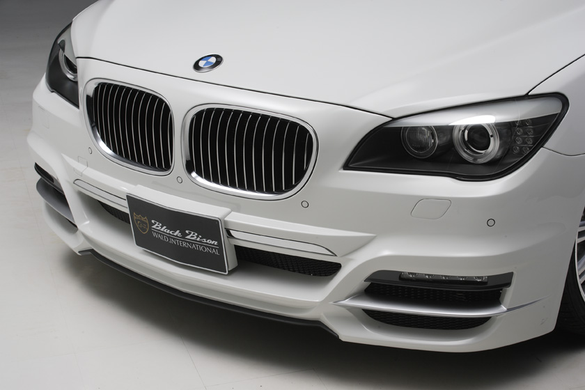 WALD BMW F01 Black Bison front bumper detail — WALD front lip spoiler, mesh and LEDGL1321 LED daytime running lamps