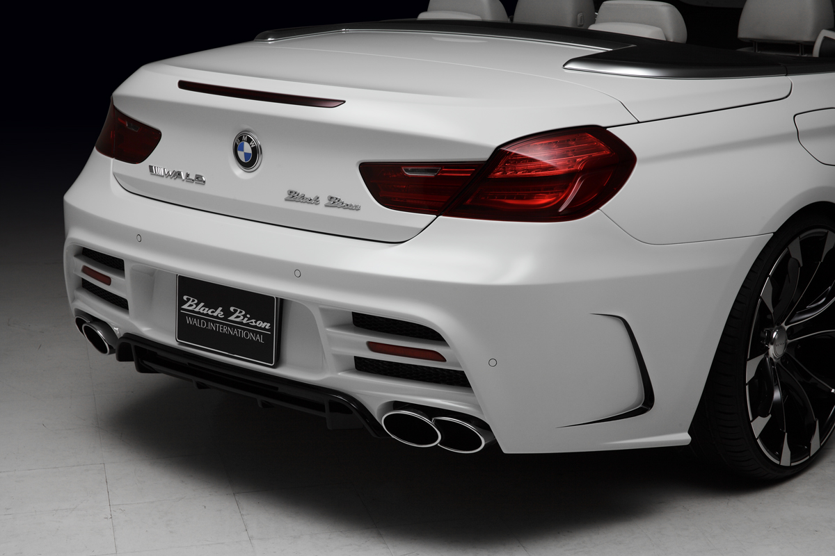 WALD BMW 6 Series Cabriolet rear detail showing WALD rear bumper spoiler, LED reflectors and exhaust tips