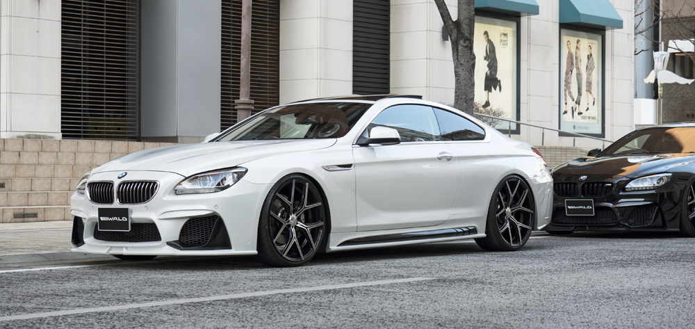 WALD BMW 6 Series Coupé F13 Black Bison body kit on location, white and black BMW 6 Series side view