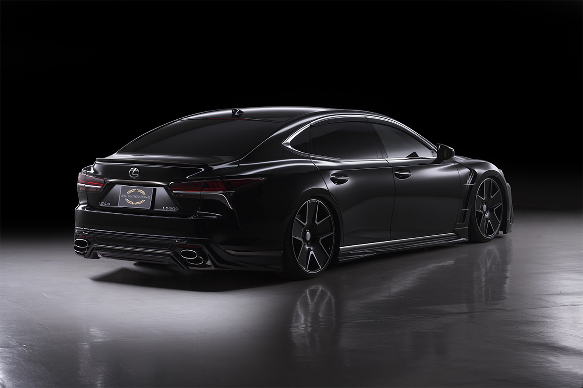 WALD Lexus LS500 F SPORT rear three-quarter studio view with WALD rear skirt and boot spoiler