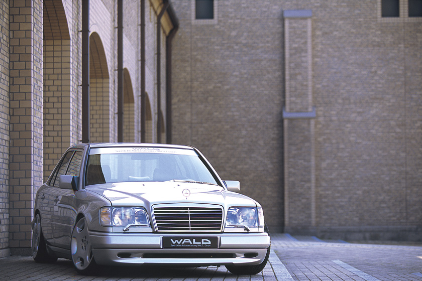 Mercedes-Benz E-Class W124 WALD Executive Line front view with WALD windscreen banner and lowered stance