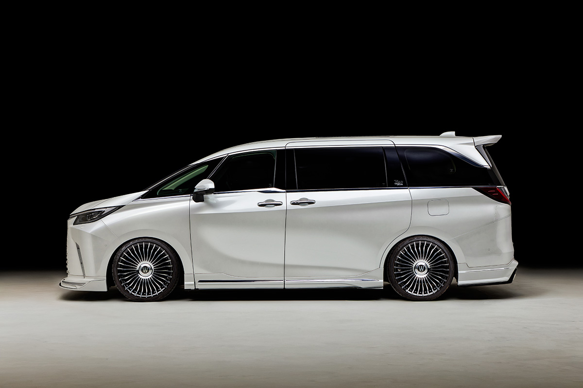 WALD Lexus LM500h TAWH15W side profile — WALD door panels with chrome-plated garnishes and roof wing