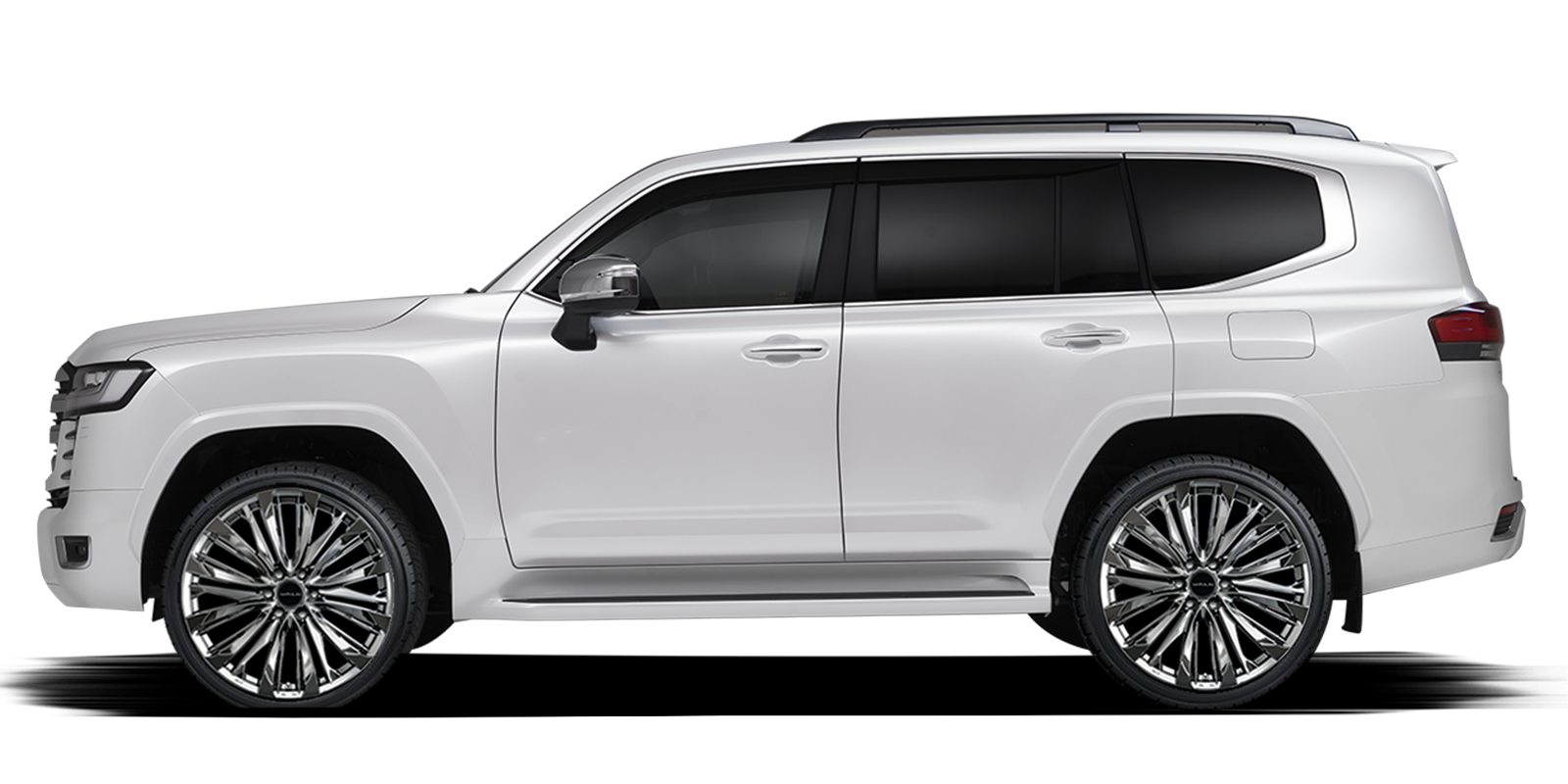 Side profile of a white Toyota Land Cruiser LC300 fitted with WALD FS001 DBC wheels