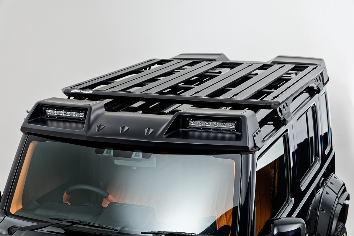 WALD Black Bison Edition Suzuki Jimny Nomade JC74W — Rhino-Rack roof rack fitted alongside the front roof spoiler LED lamp units