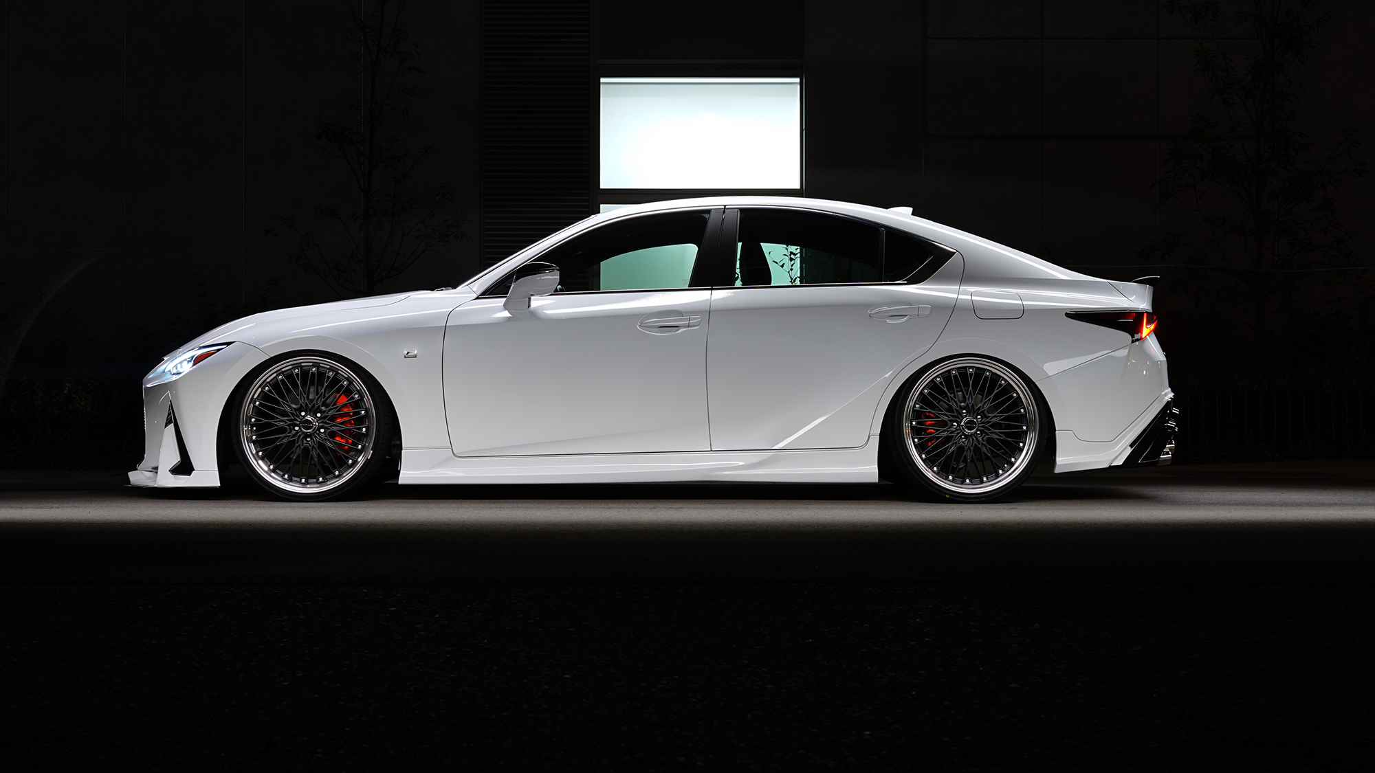 White Lexus IS side profile on WALD Classic Mesh CM12C step rim wheels