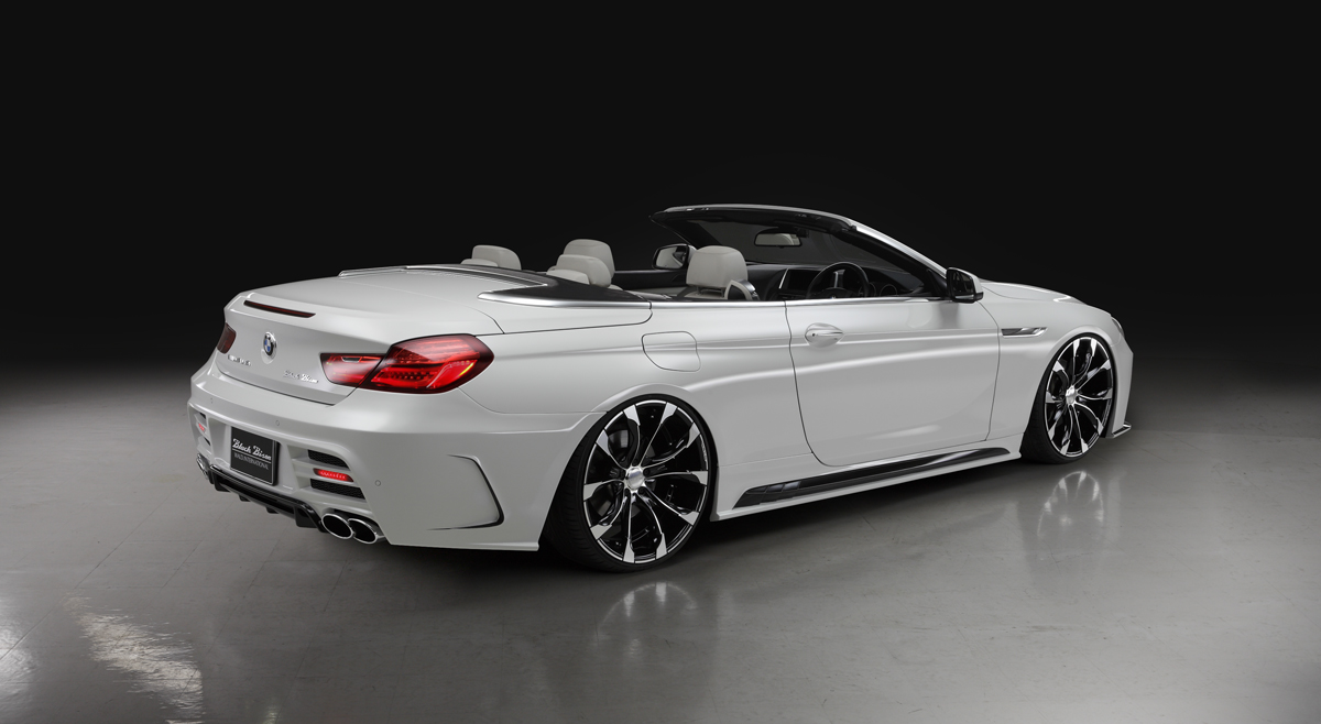 WALD BMW 6 Series Cabriolet rear three-quarter studio view with WALD Black Bison rear bumper spoiler