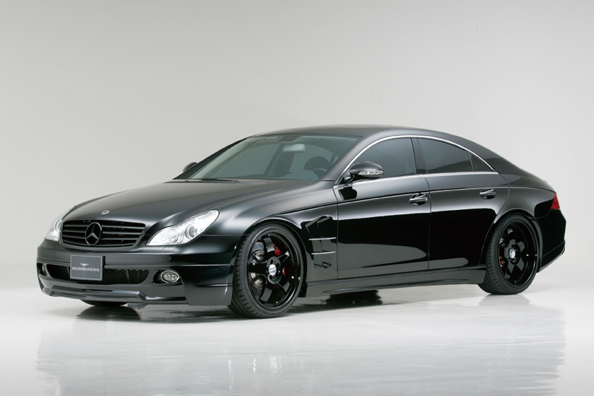 WALD Sports Line Mercedes-Benz CLS-Class C219 black side profile with WALD side skirts, sports fender duct and black WALD wheels