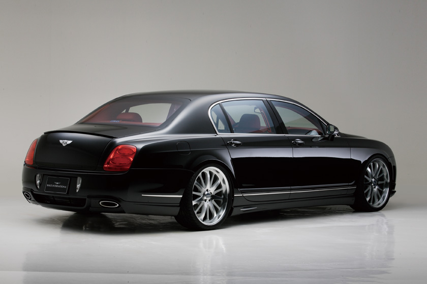 WALD Bentley Continental Flying Spur Executive Line rear three-quarter view with rear bumper skirt and oval exhaust outlet