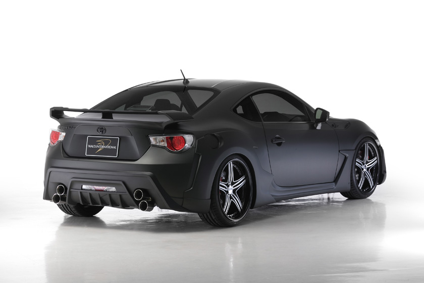 WALD Toyota GT86 ZN6 Sports Line rear three-quarter studio view with rear wing and rear bumper spoiler