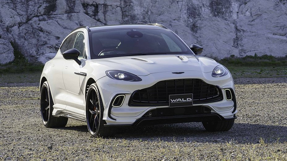 WALD Aston Martin DBX Black Bison Edition body kit — white DBX front three-quarter view with WALD front lip spoiler
