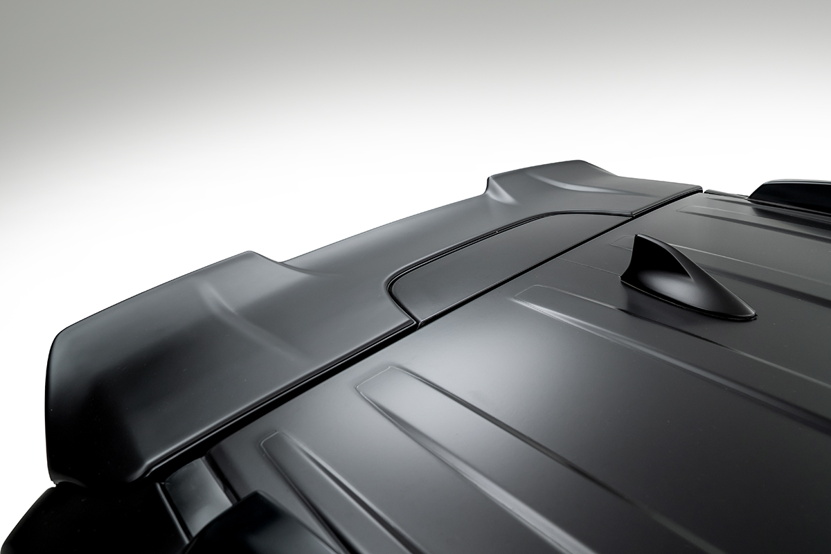 WALD Land Cruiser 300 ZX roof spoiler profile detail in matte black FRP