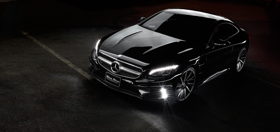 Mercedes-Benz S-Class Coupe C217 WALD body kit at night with LED front spoiler lamps illuminated