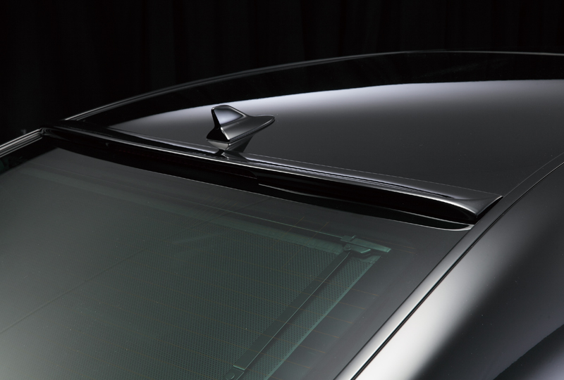 WALD Lexus LS F SPORT roof spoiler detail in gloss black above the rear screen