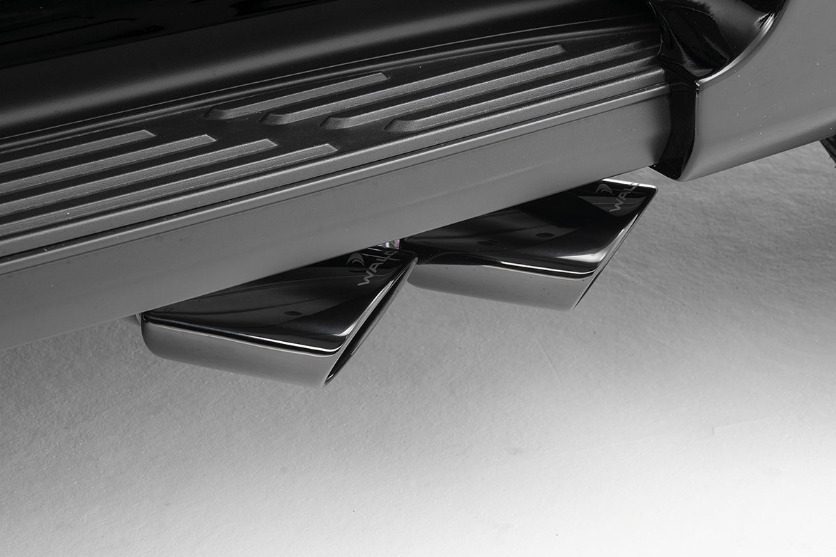 WALD Lexus LX600 side exit exhaust detail — dual oval 117W stainless tips exiting beneath the side step
