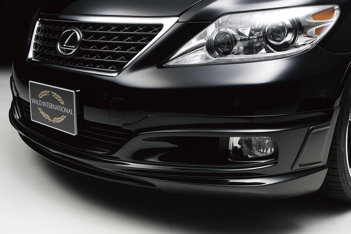 WALD Lexus LS460L front spoiler detail with carbon fibre front spoiler duct and WALD International plate
