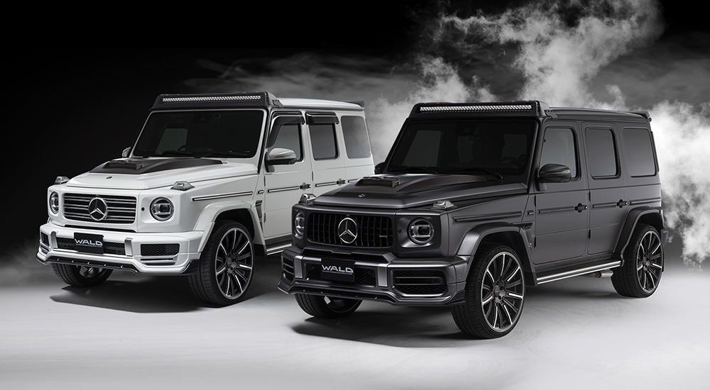 WALD Sports Line Mercedes G-Class W463A pair — white and grey G63 AMG with WALD body kits