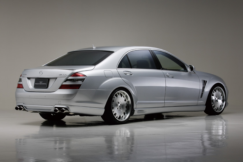 WALD Executive Line Mercedes-Benz S-Class W221 rear three-quarter studio view with rear skirt and quad exhaust tips