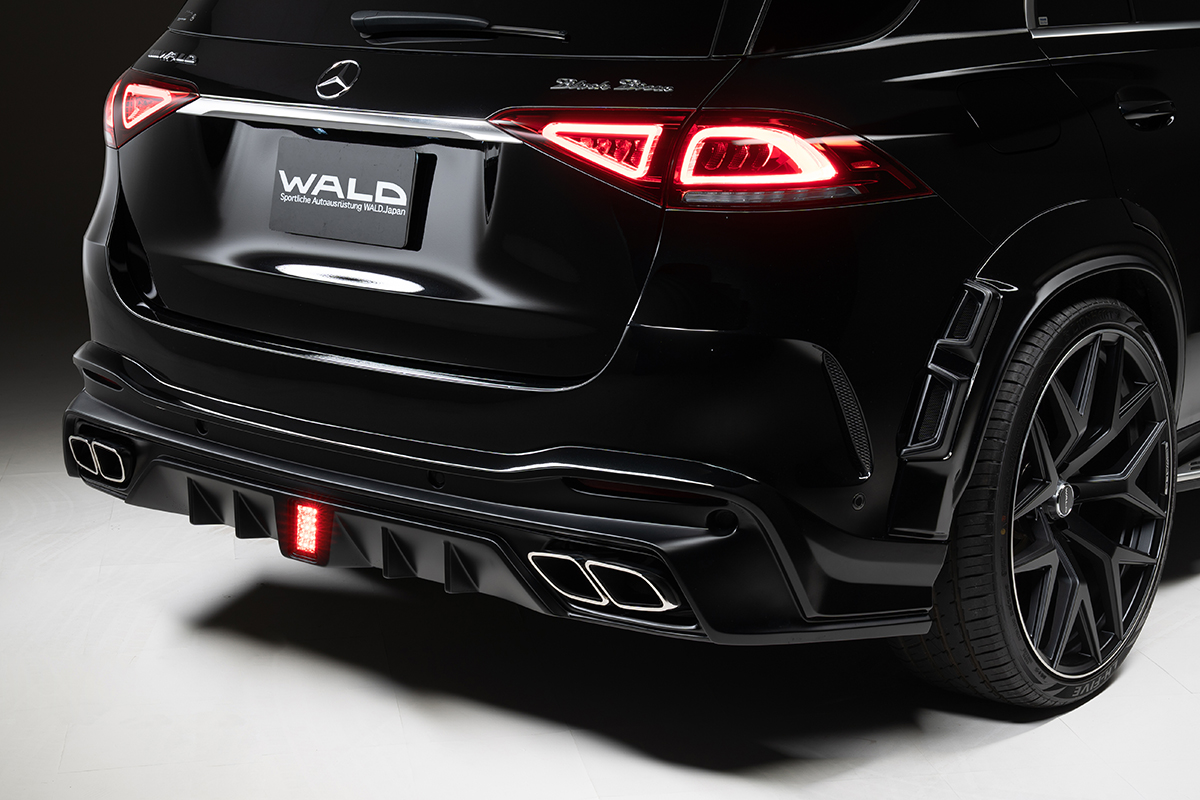 WALD Black Bison GLE W167 rear diffuser detail with illuminated LED brake lamp and exhaust tips
