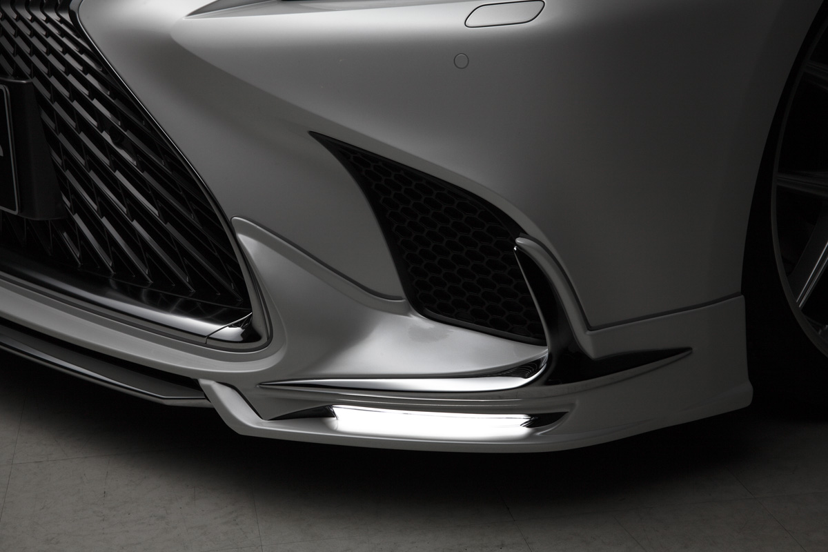 WALD Lexus LS500 front spoiler detail with chrome garnish and duct treatment