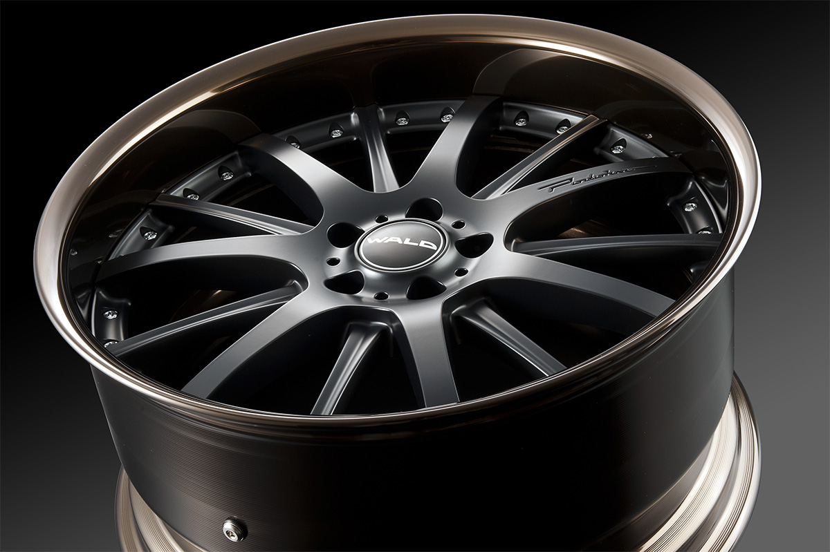 WALD Portofino P12C 2-piece forged wheel photographed with a bronze-tone alumite rim lip
