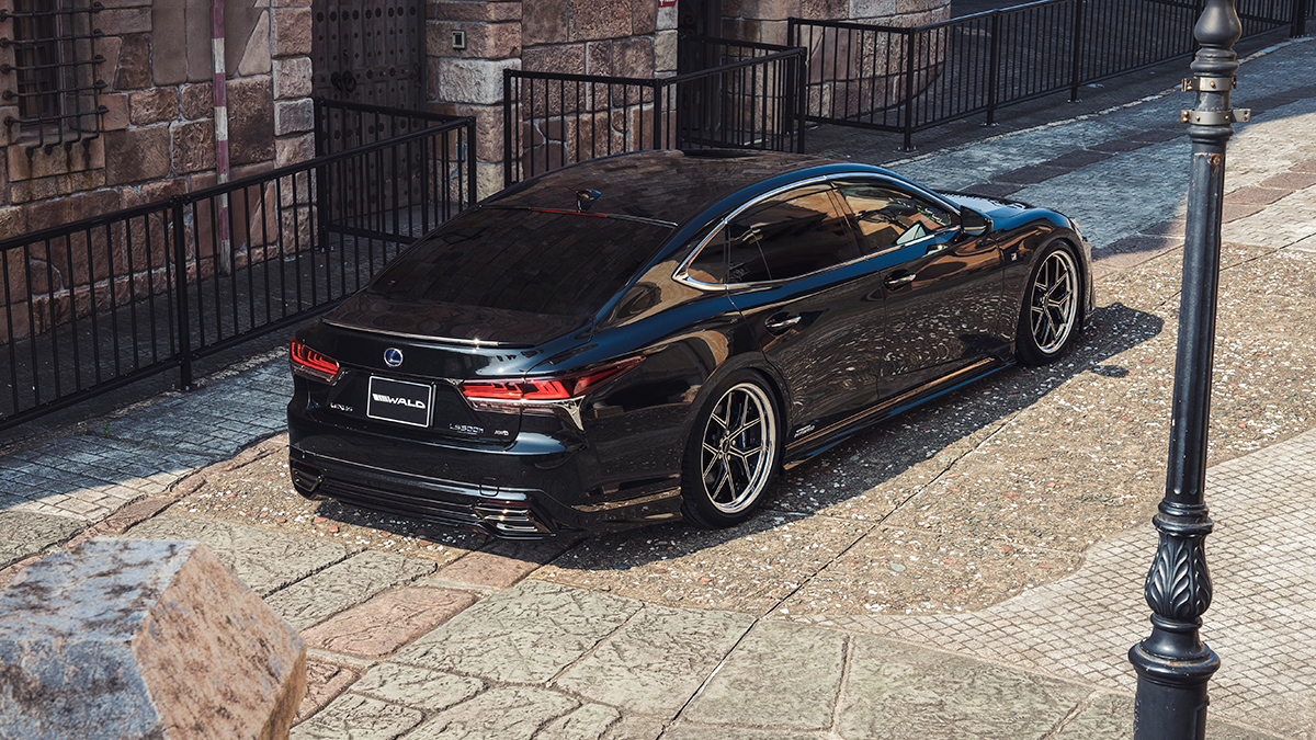 WALD Lexus LS500h F SPORT rear three-quarter elevated view showing WALD rear skirt and boot spoiler