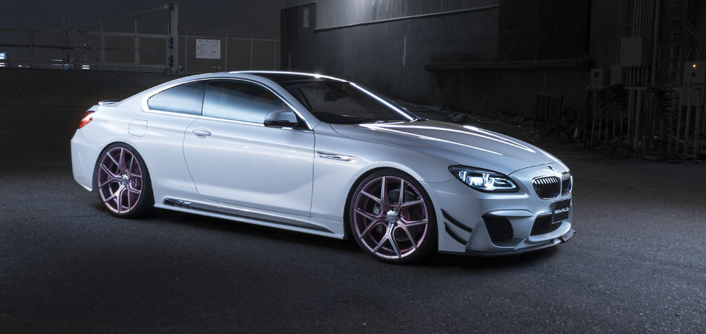 WALD BMW 6 Series Coupé F13 Black Bison body kit photographed at night, front three-quarter view
