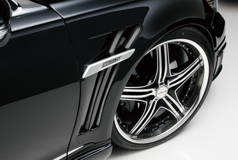WALD Lexus LS460L sport fender duct with chrome WALD emblem beside a polished multi-spoke WALD wheel