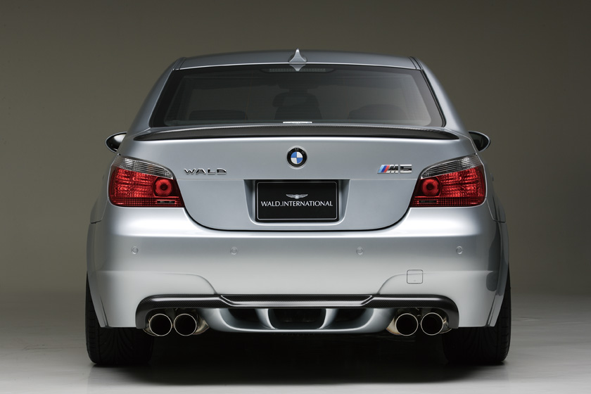 WALD BMW M5 E60 direct rear view with WALD rear bumper spoiler and quad exhaust tips