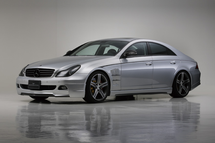 WALD Sports Line Mercedes-Benz CLS-Class C219 — low front three-quarter studio view with WALD front spoiler, side skirts and sports fender ducts
