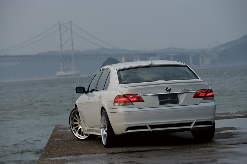 WALD BMW 7 Series E66 Sports Line rear three-quarter location view showing WALD roof spoiler and rear bumper spoiler