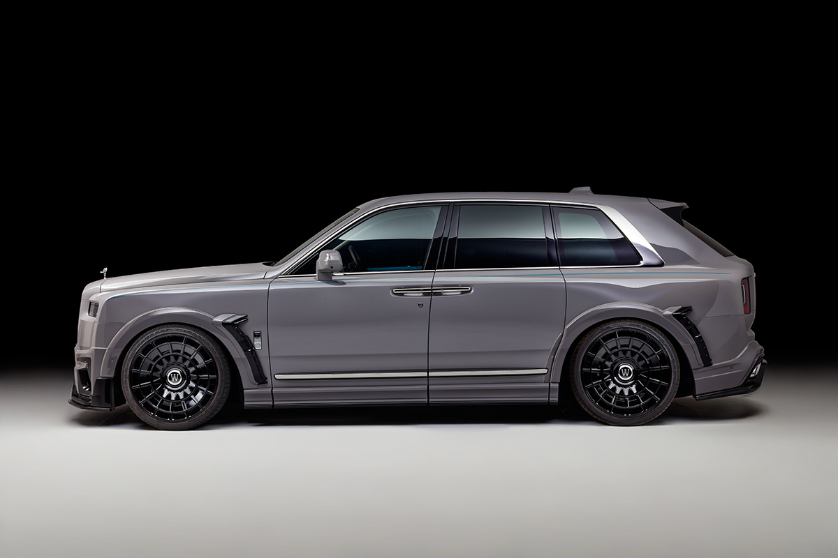 Side profile of a grey wide body Rolls-Royce Cullinan on WALD ZETTON Forged 24x10.0 wheels