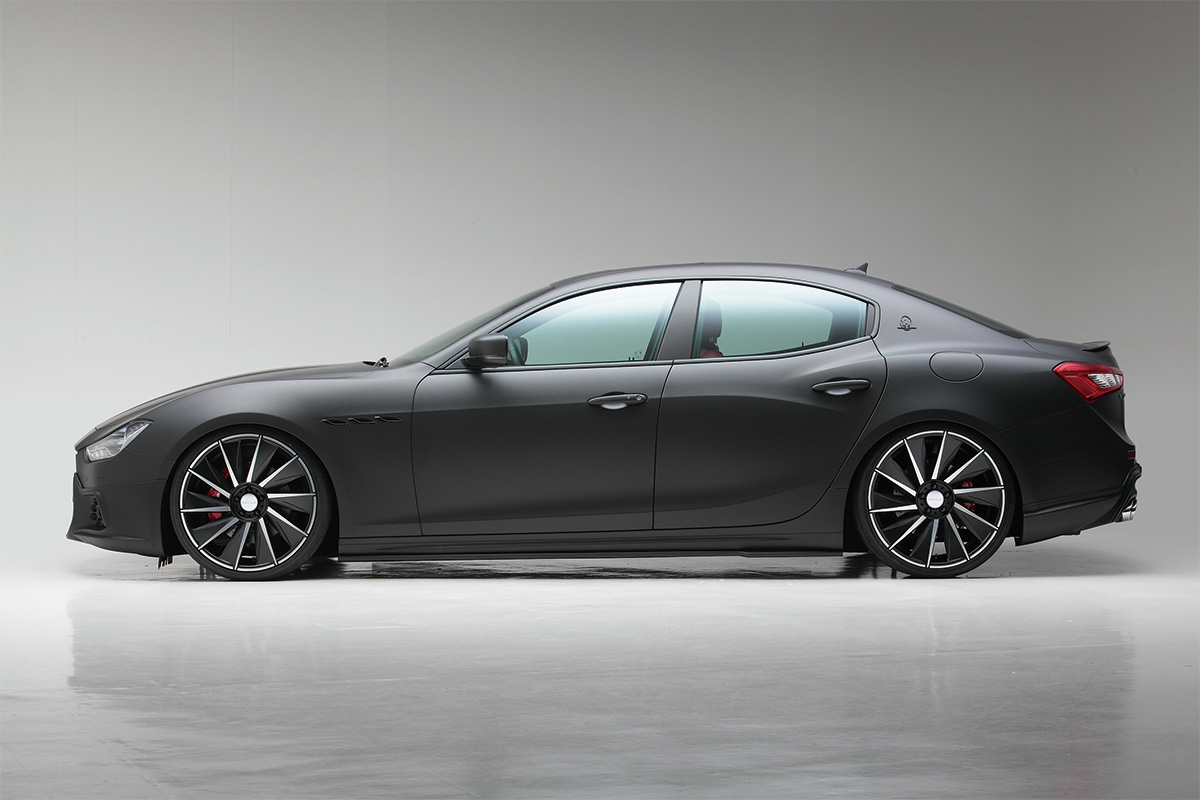 WALD Maserati Ghibli body kit — side profile showing the WALD side skirts and wheel fitment