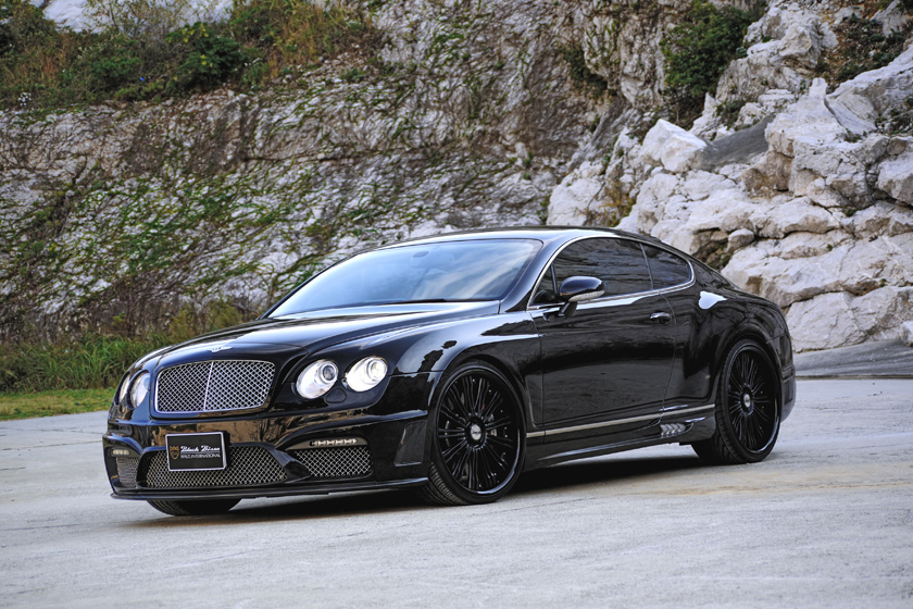 WALD Bentley Continental GT Black Bison body kit 2008 2010 — black coupe front three-quarter view on location
