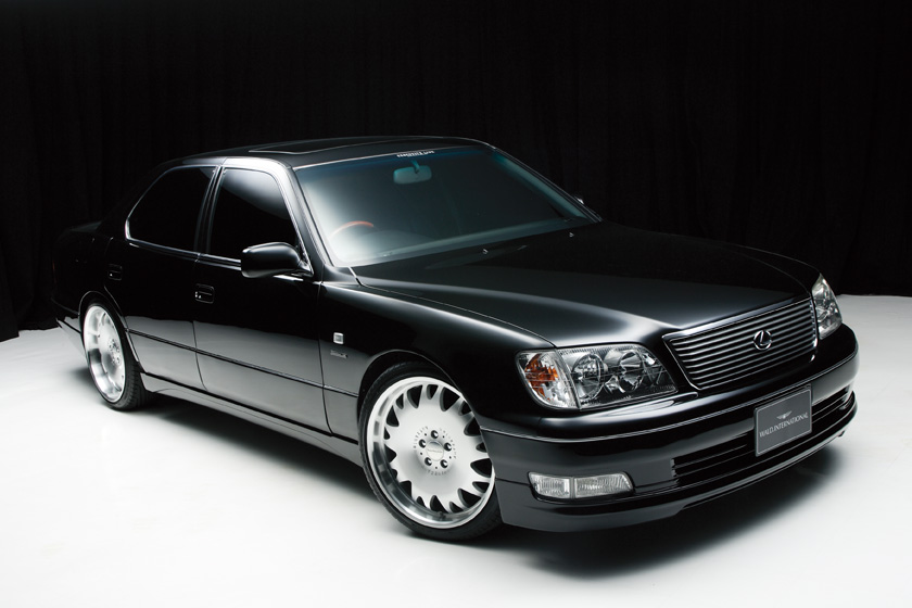 WALD Executive Line Toyota Celsior UCF20/21 — front three-quarter studio view with WALD front spoiler and turbine-style wheels