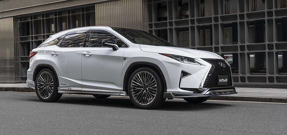 White WALD Lexus RX450h F SPORT front three-quarter view with front spoiler and multi-spoke wheels