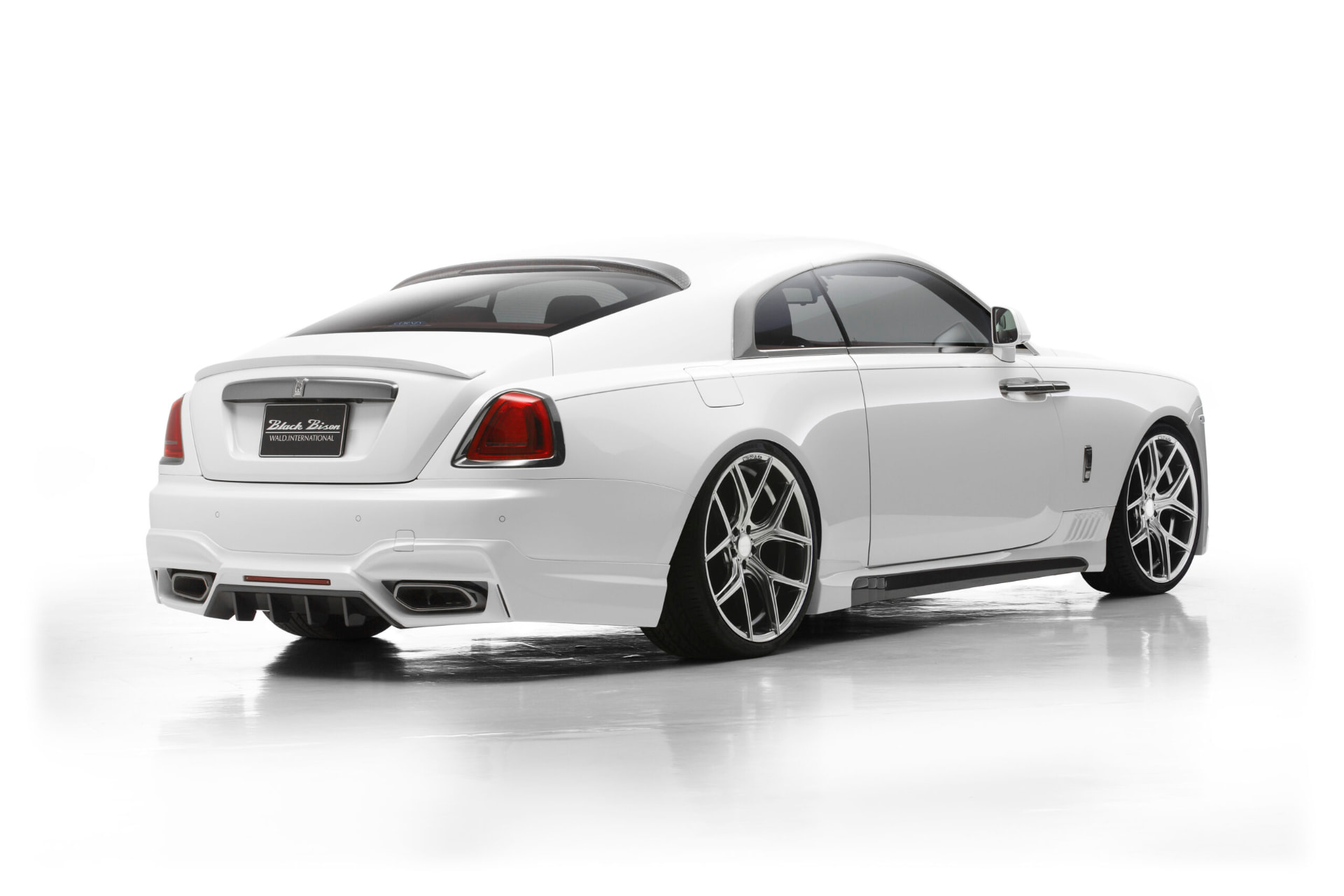 Rolls-Royce Wraith Black Bison Edition — rear three-quarter view with rear skirt spoiler and boot spoiler