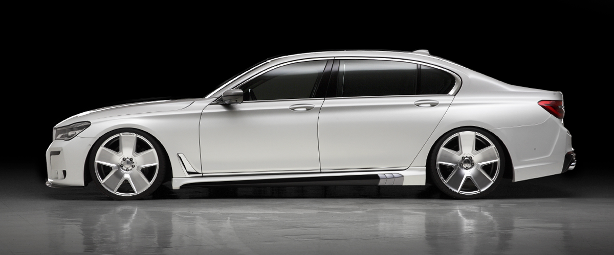 WALD BMW 7 Series G12 Black Bison full side profile showing WALD side skirts and lowered stance on the long wheel base saloon