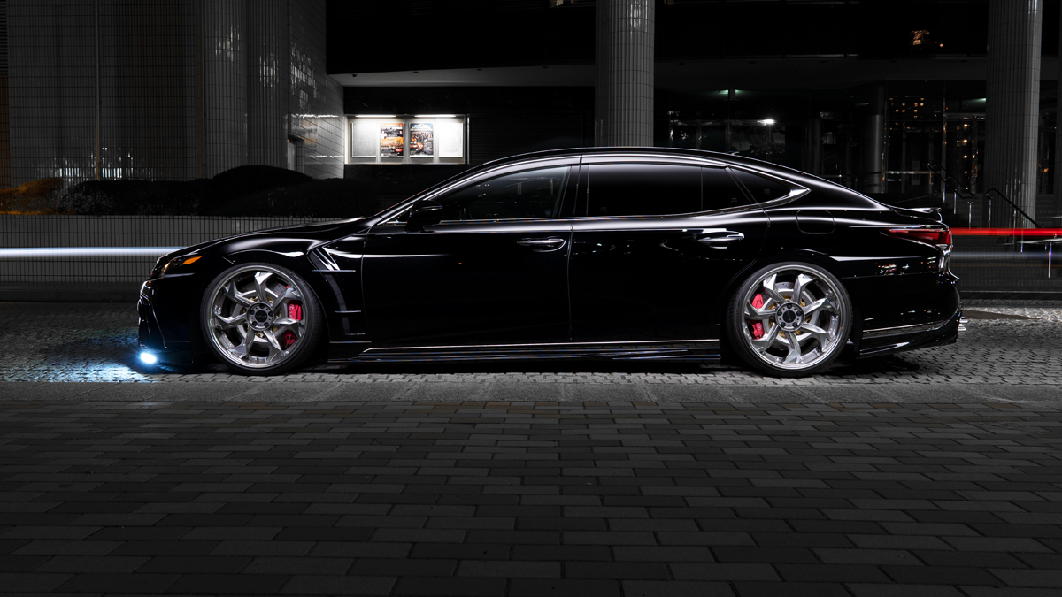 WALD Lexus LS500 F SPORT full side profile at night on WALD wheels with red brake calipers