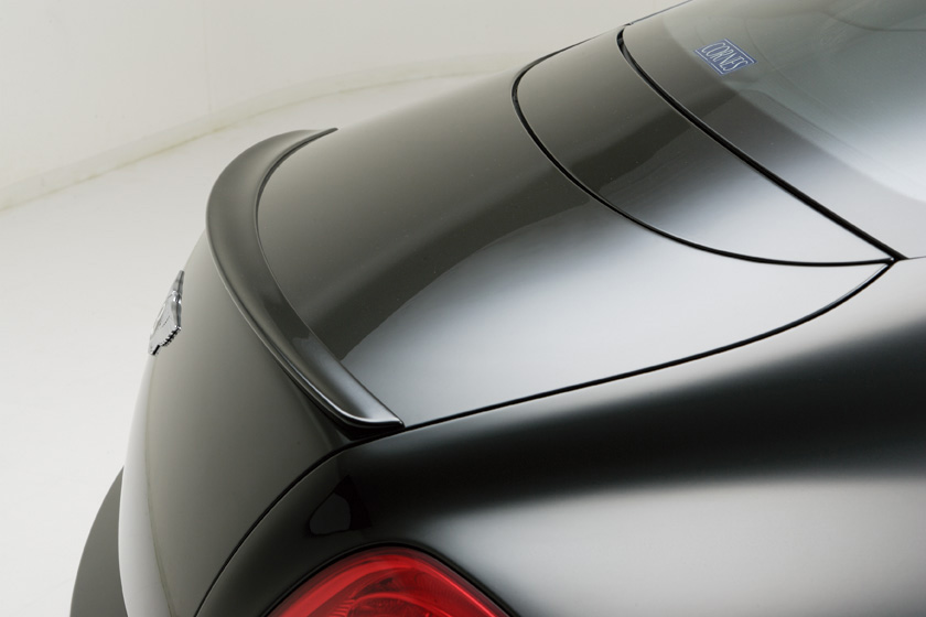 WALD Bentley Continental GT boot spoiler close-up detail on black bodywork