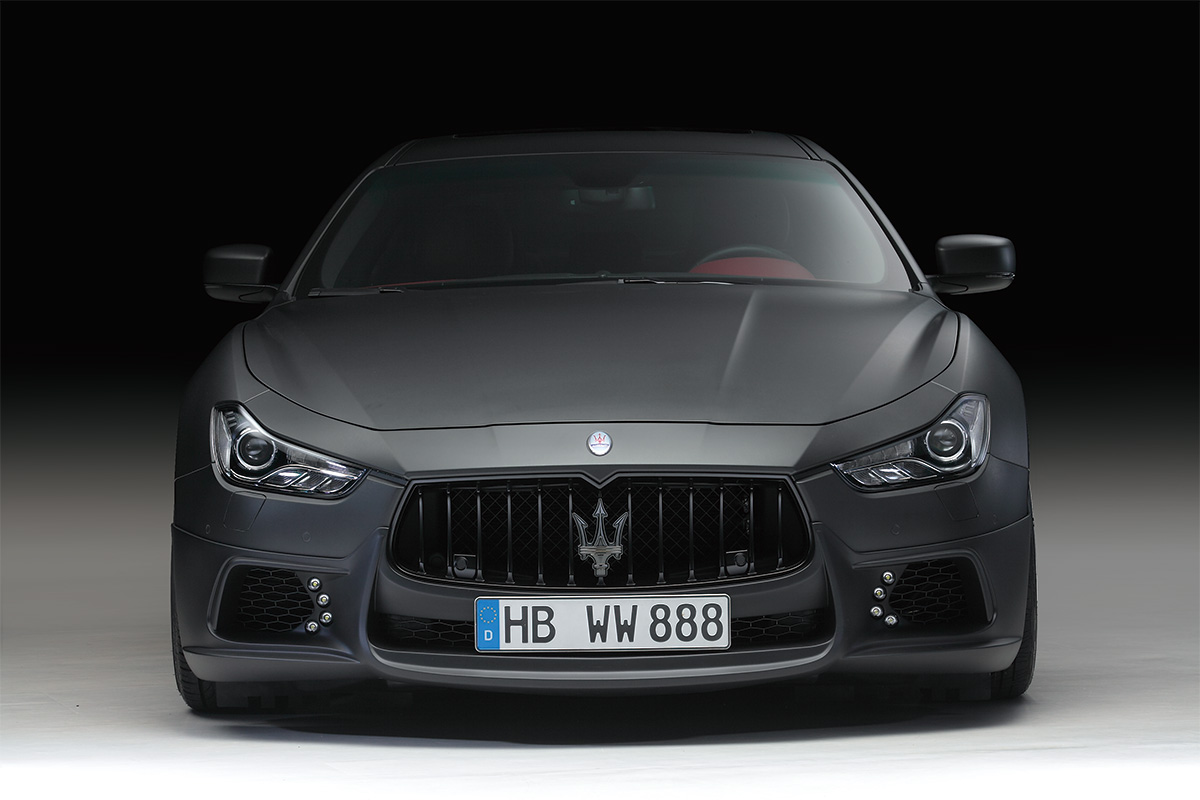 WALD Black Bison Maserati Ghibli — head-on front view with WALD front lip spoiler and LED lamps